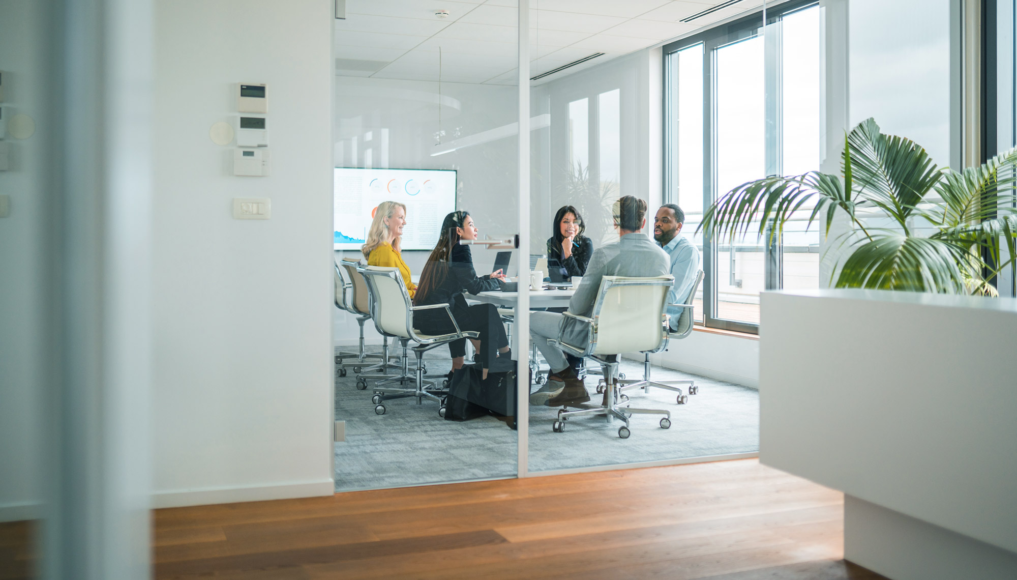 Team of Female and Male Members in Meeting